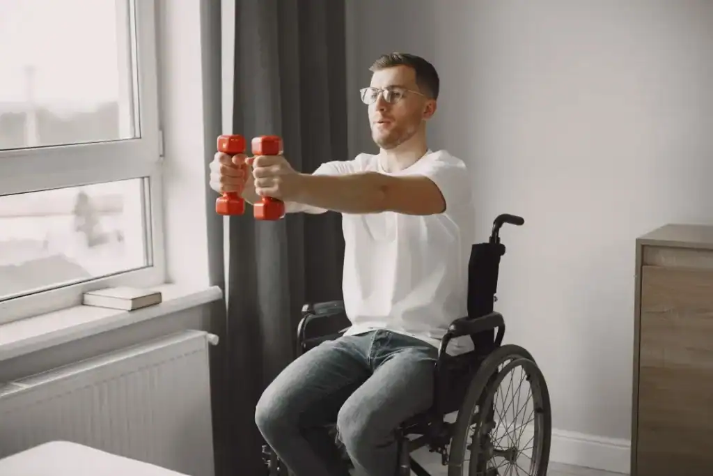 Image of man doing exercise in his wheelchair to aid weight loss Trowbridge
