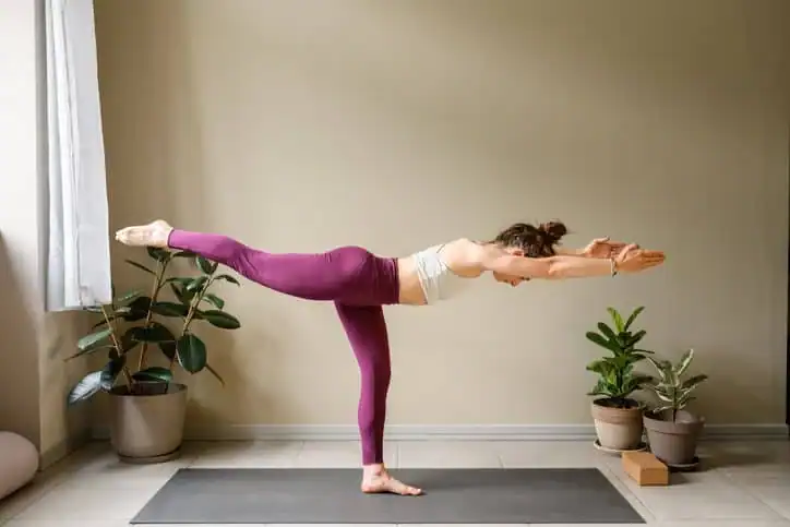 Achieving the Perfect Tone: How Often Should You Exercise for Results? 1 Woman doing Yoga exercise Trowbridge to help with toning the body.