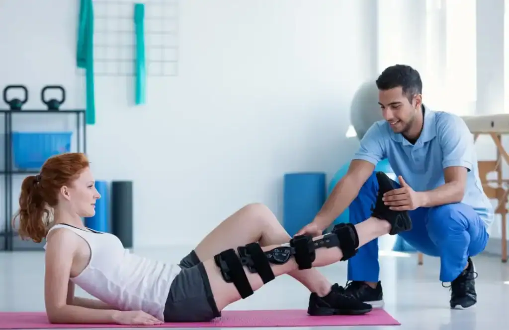 Woman having treatment to help muscle recovery Trowbridge after an injury