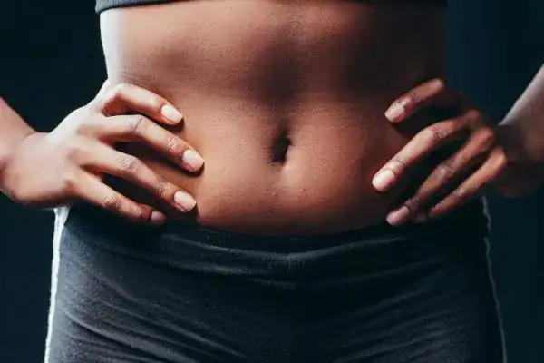Toning Your Stomach: The Ultimate Guide to Achieving a Sculpted Stomach While Shedding Pounds 1 Image of a toned stomach after non surgical treatment Trowbridge